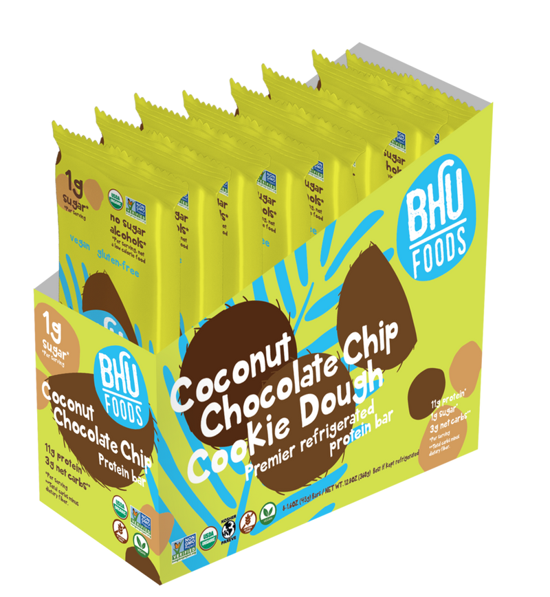 An open box of Coconut Chocolate Chip Cookie Dough Premier Refrigerated Protein Bar with eight individually wrapped bars (1.6oz each) inside.