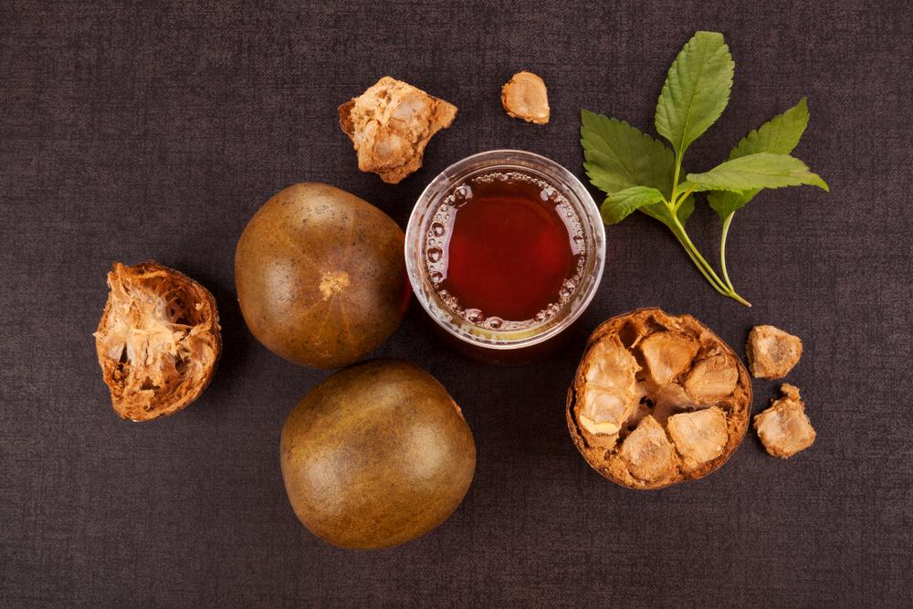 Monk fruit products with pure monk fruit sweetener on a table.