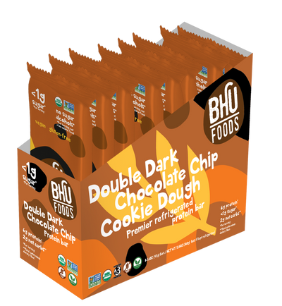 An open box of Double Dark Chocolate Chip Cookie Dough Premier Refrigerated Protein Bar with eight individually wrapped bars (1.6oz each) inside.