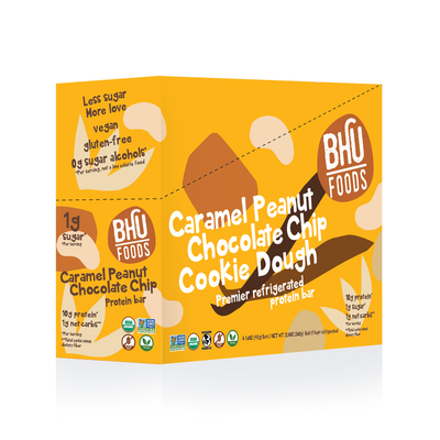 A closed box of Caramel Peanut Chocolate Chip Cookie Dough Premier Refrigerated Protein Bar.